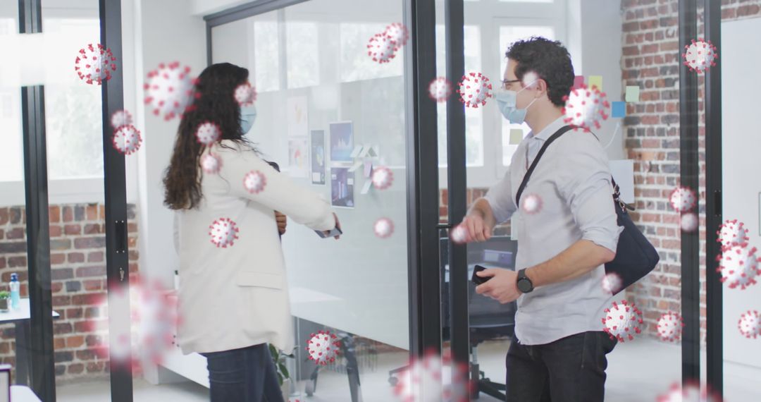 Office Colleagues with Protective Masks Performing Sanitized Elbow Bump