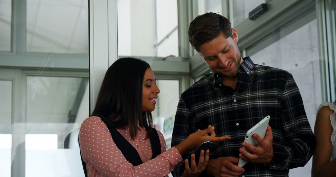 Collaborative Discussion Between Business Professionals Using Tablet