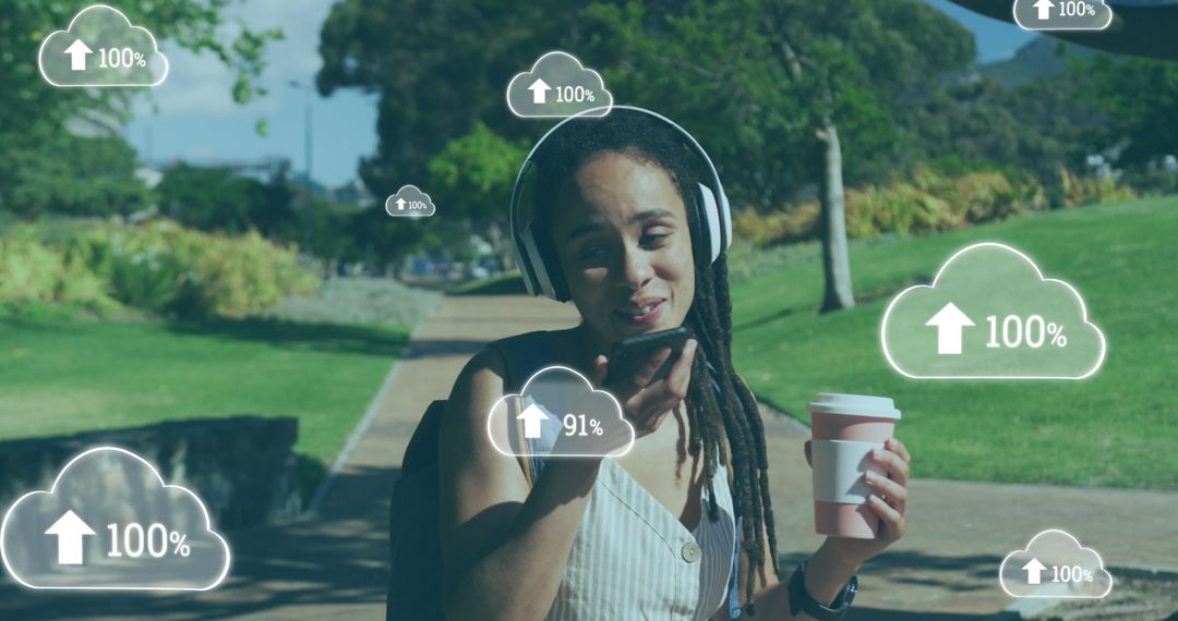 Woman Using Smartphone Outdoors with Cloud Computing Icons Overlay