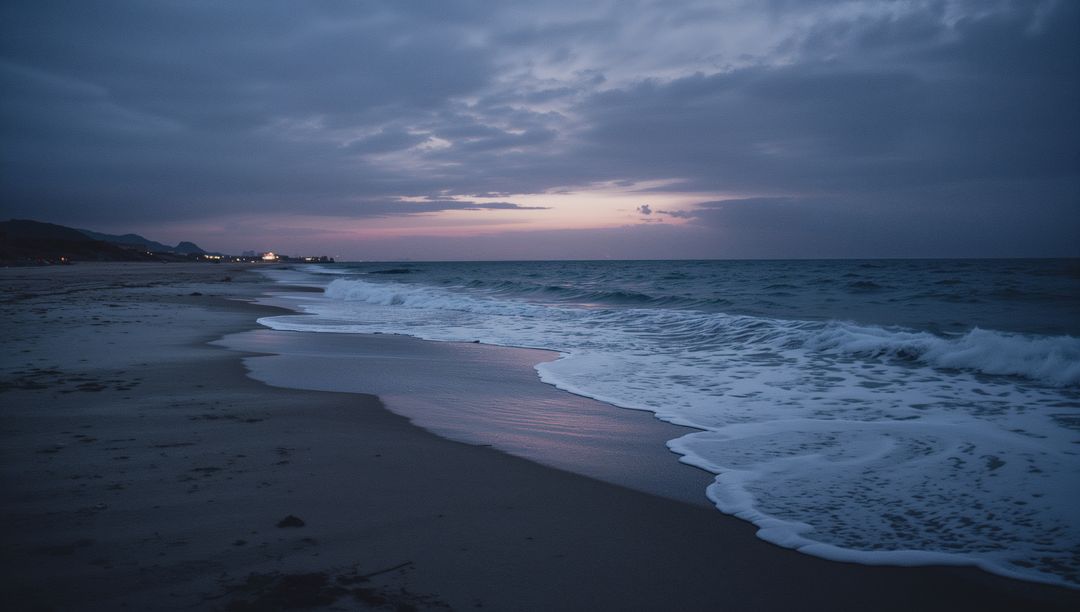 Twilight Beach Reflecting Pastel Sky, Waves Rolling onto Quiet Shoreline at Dusk