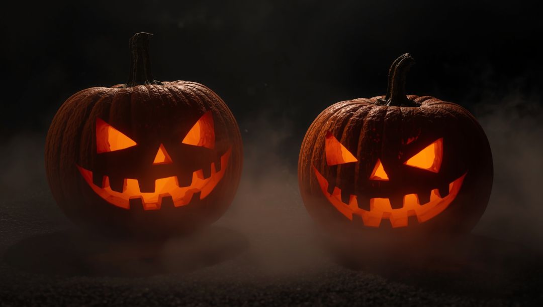 Glowing Jack-o'-lanterns on Foggy Nighttable Creating Spooky Halloween Ambiance