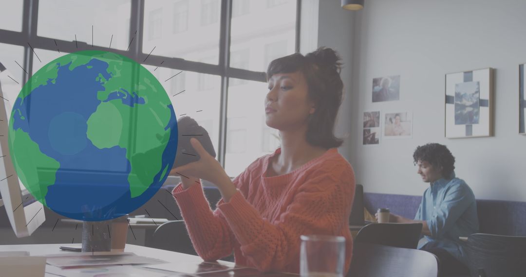 Businesswoman Analyzing Virtual Globe Interface at Modern Workspace