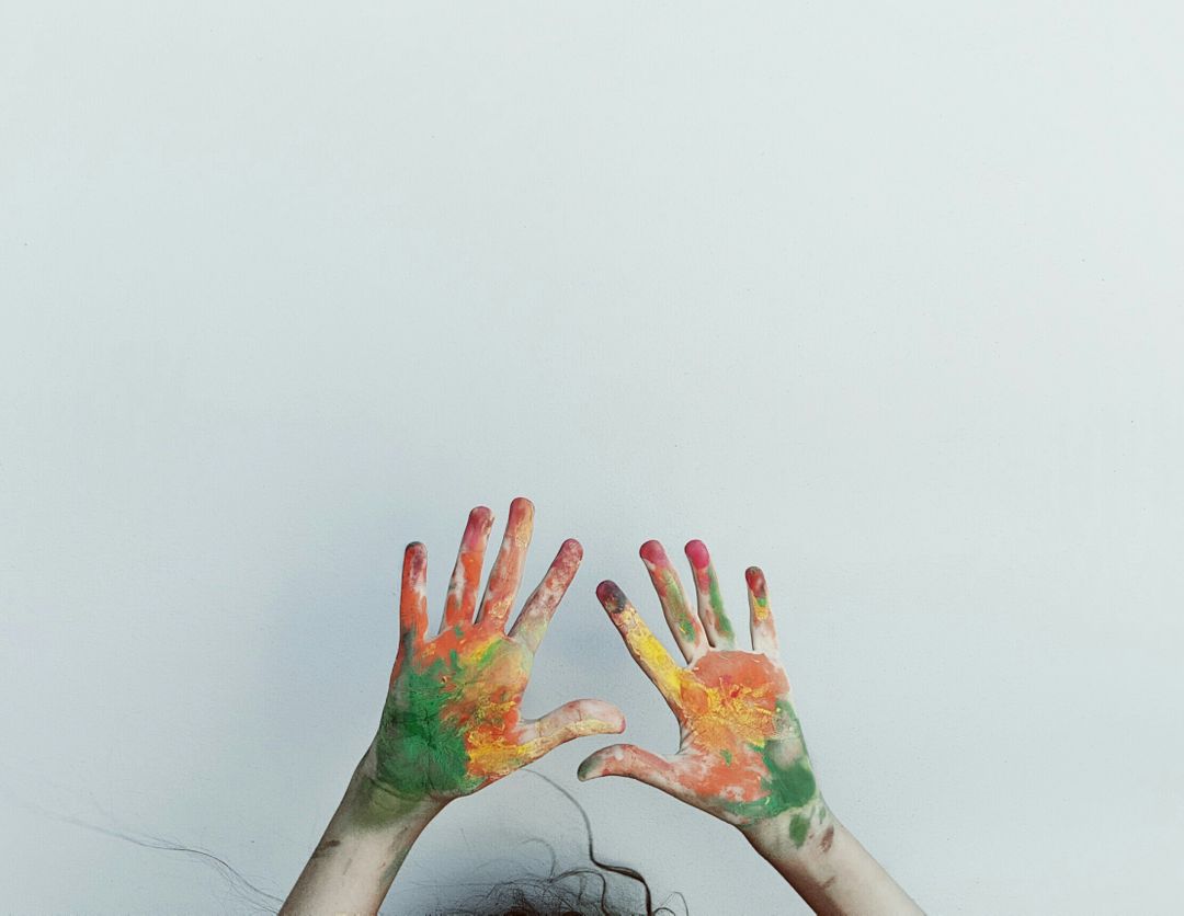 Colorful Painted Hands Displaying Artistic Creativity Against White Background - Free Images, Stock Photos and Pictures on Pikwizard.com