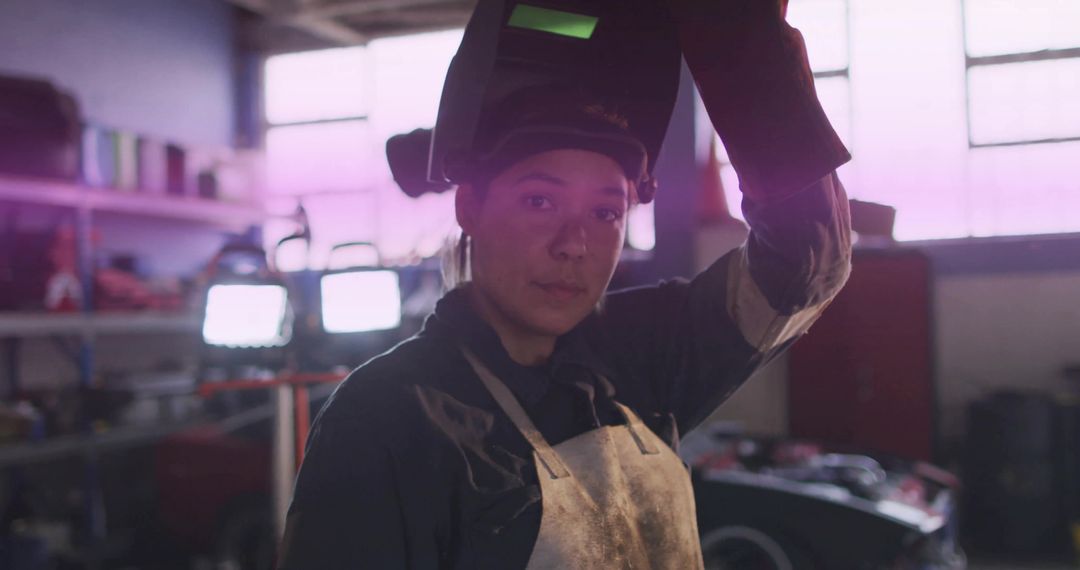 Female Welder Conducting Equipment Check in Workshop