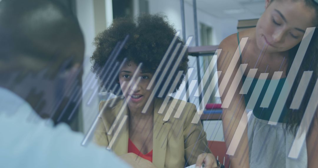 Diverse Team Analyzing Financial Data and Trends in Office