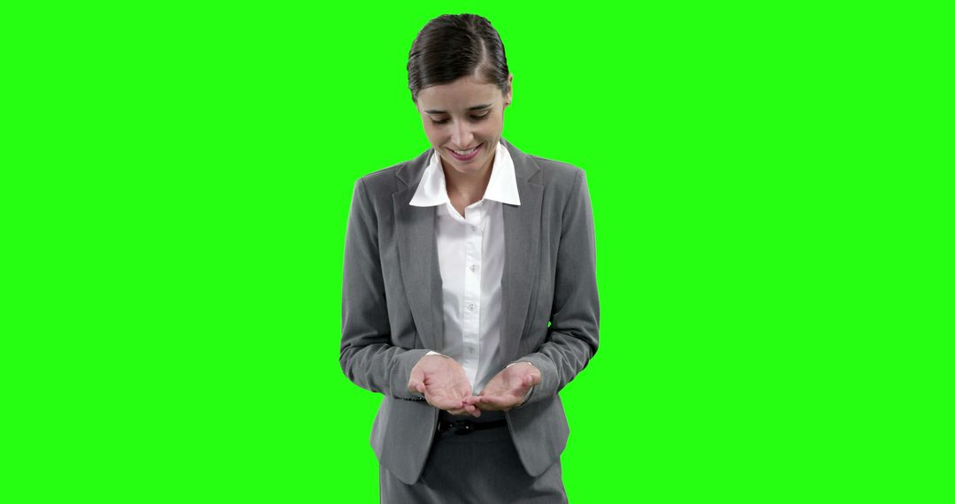 Businesswoman Looking Curiously at Empty Hands Green Screen Background - Free Images, Stock Photos and Pictures on Pikwizard.com