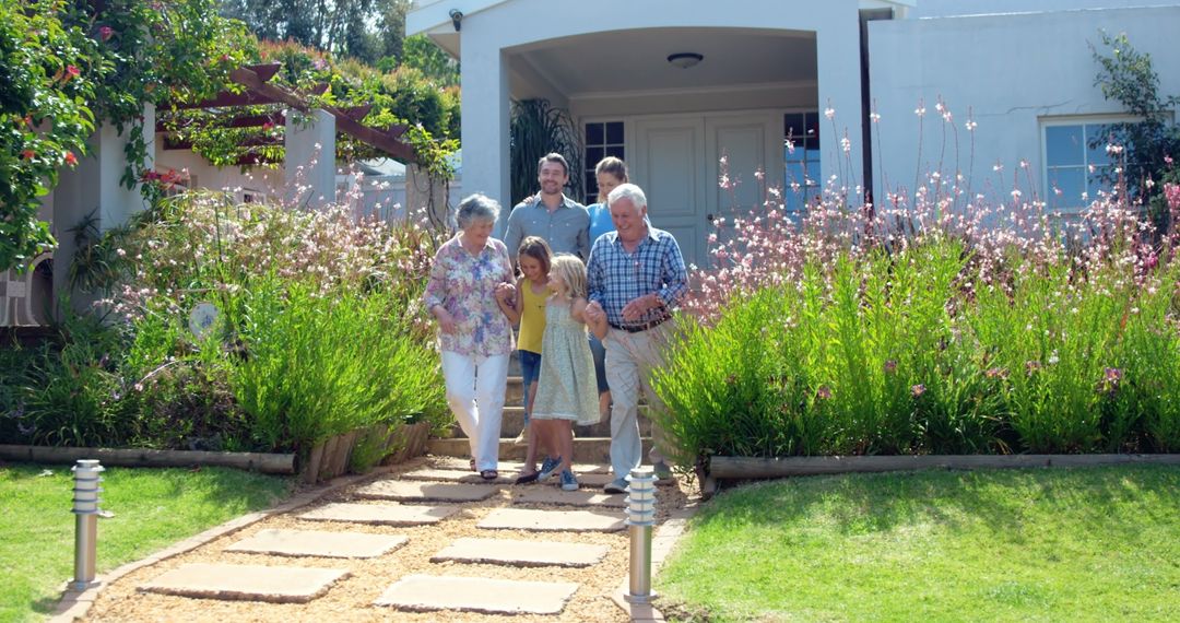 Multigenerational Family Walking Down Home Garden Path Together - Free Images, Stock Photos and Pictures on Pikwizard.com