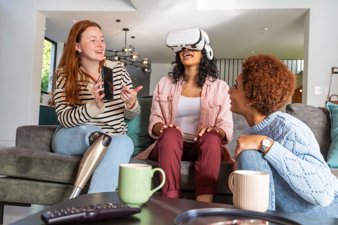 Diverse Women Experiencing Virtual Reality in Cozy Home