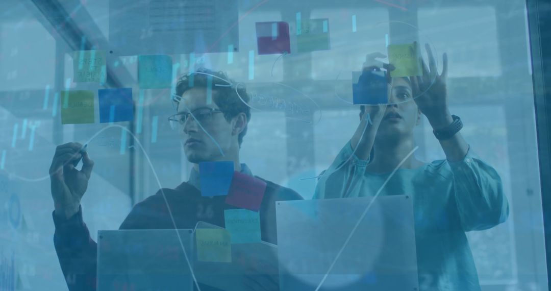 Team Planning Business Strategy with Digital Interface