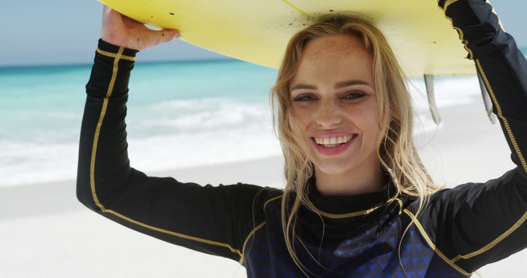 Smiling Surfer Carrying Surfboard on Sandy Beach - Free Images, Stock Photos and Pictures on Pikwizard.com