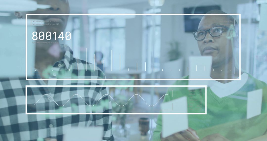 Diverse Professionals Analyzing Financial Data in Modern Office Space