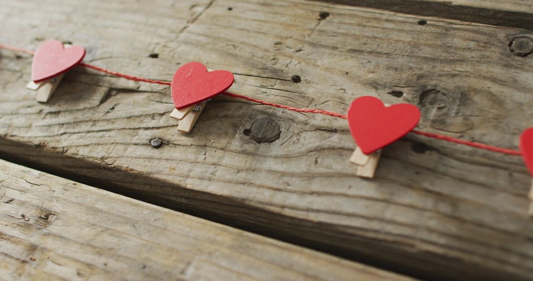 Red Paper Hearts Garlands On Rustic Wooden Planks