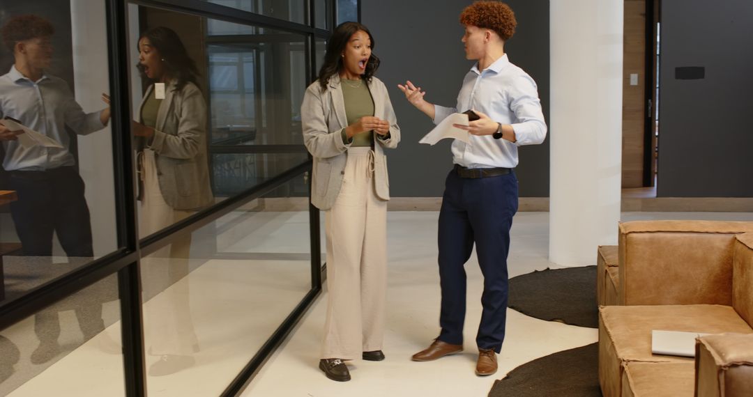 Diverse Business Professionals Collaborating in Stylish Office Setting