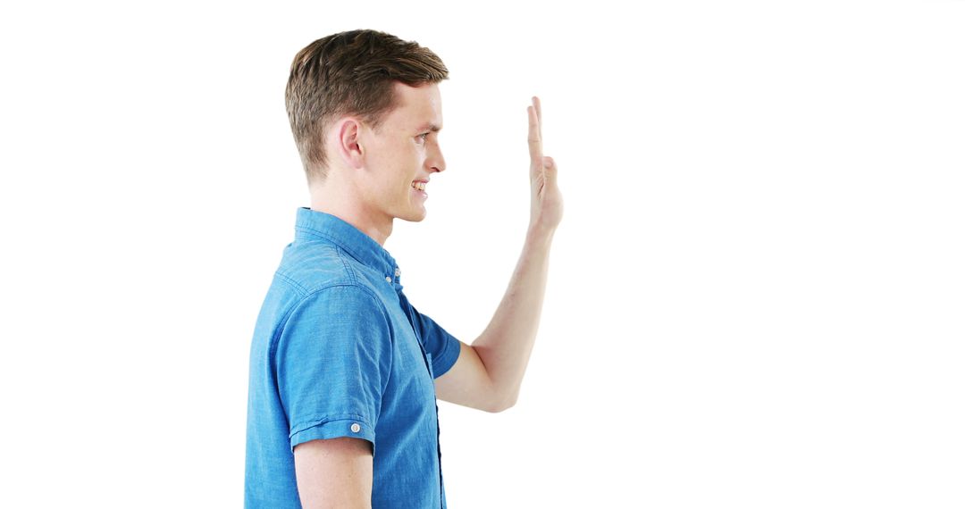 Young Man Waving Hand Against White Background - Free Images, Stock Photos and Pictures on Pikwizard.com