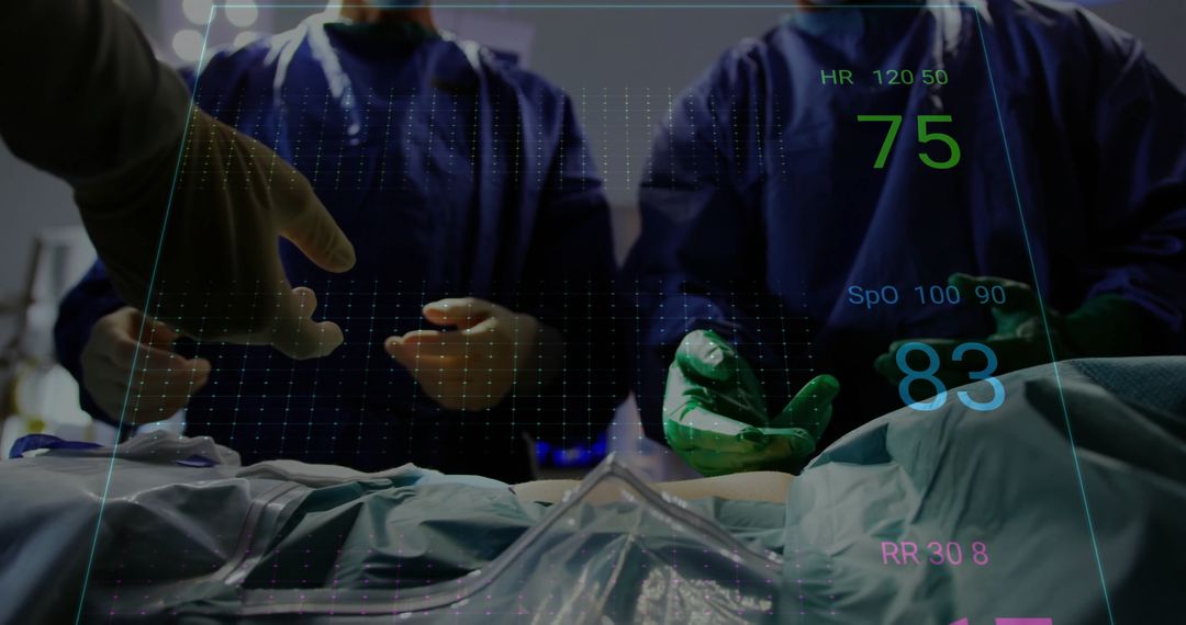 Surgical Team Operating with Vital Signs Display in Hospital