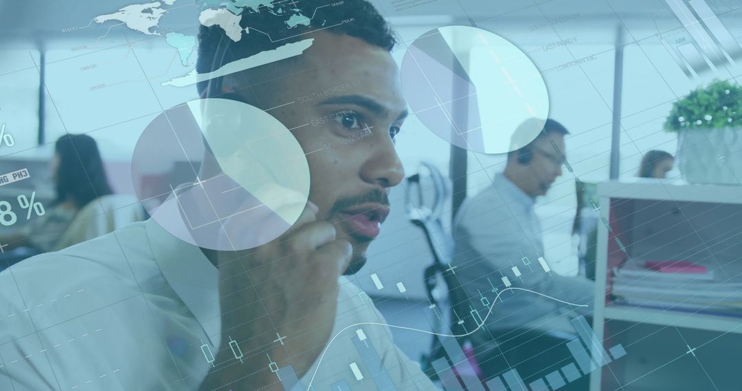 Technology Concept with Diverse Teams Analyzing Data Interfaces in Office