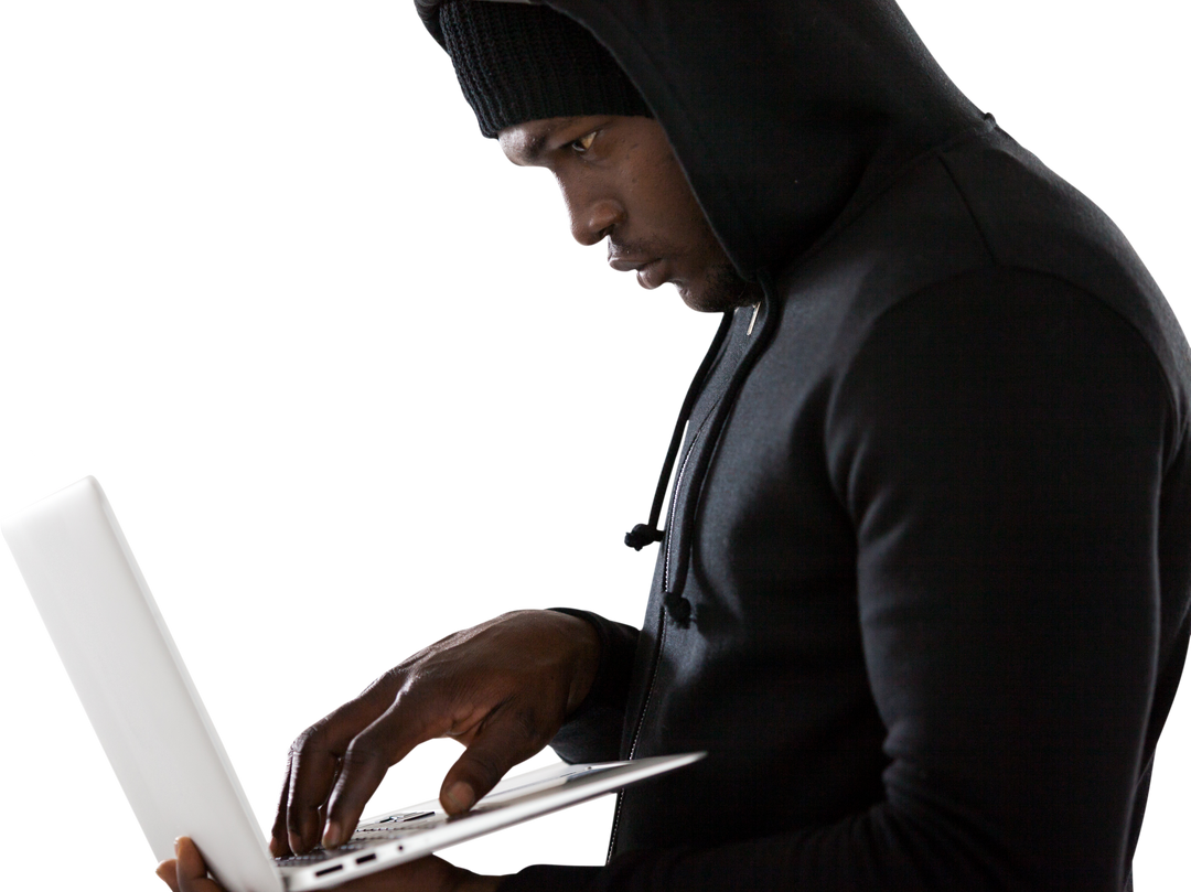 Focused Hacker Using Laptop in Hoodie Isolated on Transparent Background - Download Free Stock Images Pikwizard.com