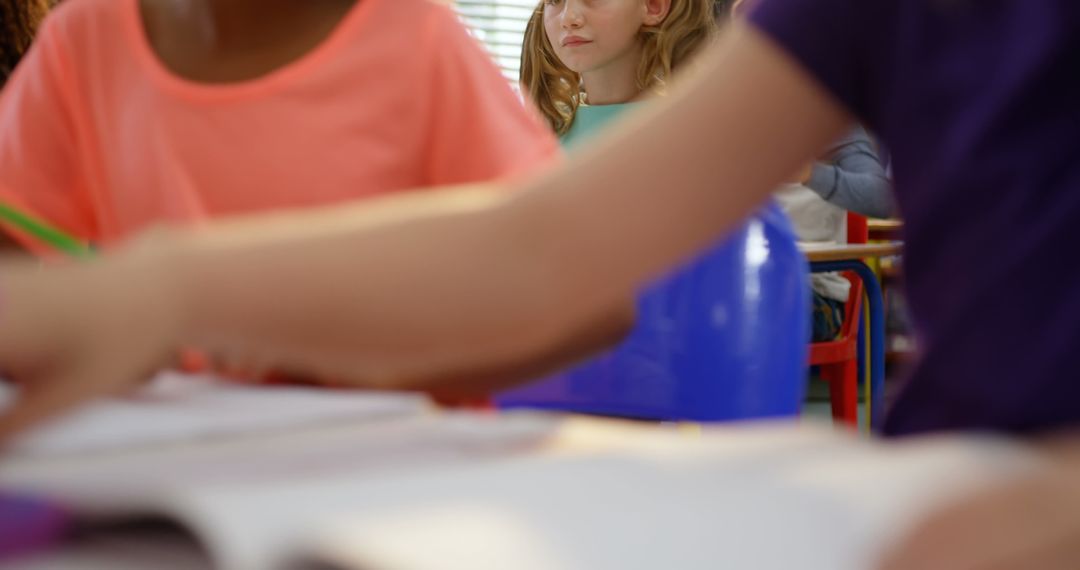Young Students in Classroom Engaged in Learning Activities