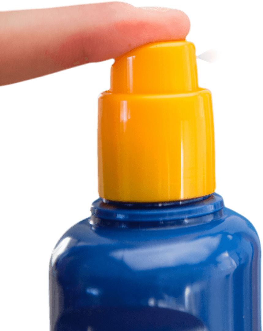 Close-Up of Transparent Bottle Pump with Finger Pressing Nozzle
