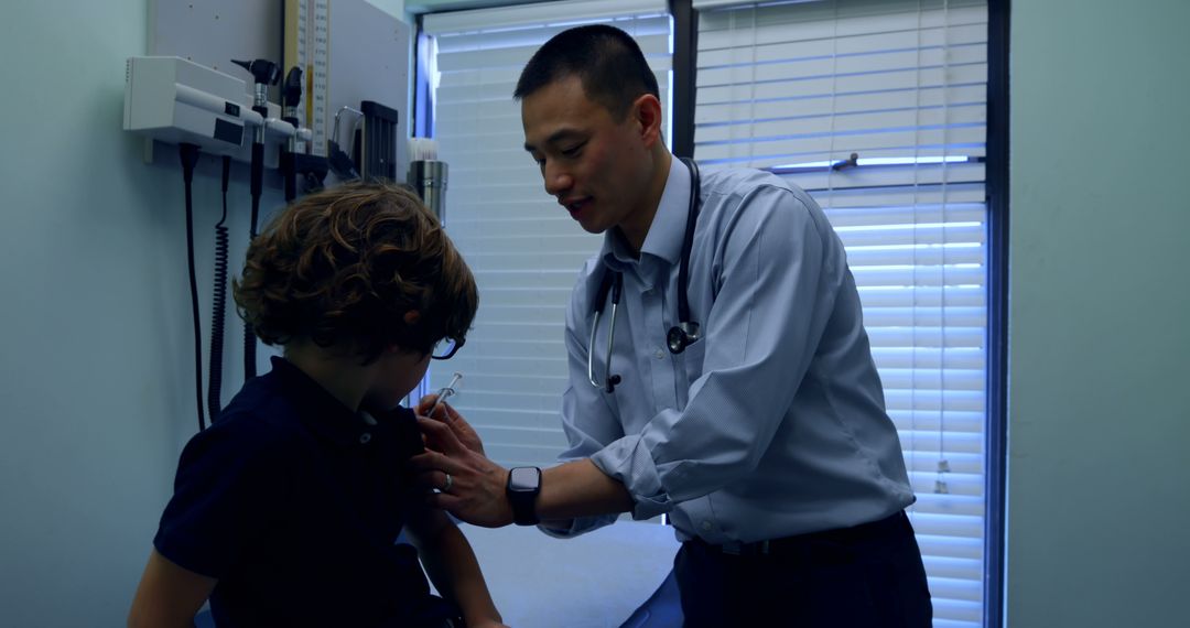 Doctor Giving Young Patient a Vaccination - Free Images, Stock Photos and Pictures on Pikwizard.com