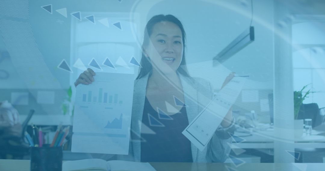 Businesswoman Presenting Data Insights with Digital Graphics Overlay