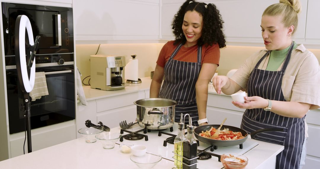 Friends Creating Cooking Content in Modern Kitchen