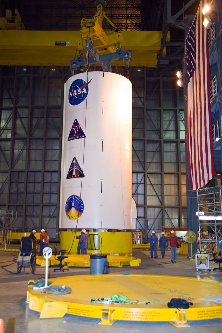 Crane Lifting Ares I-X Super Stack 3 in NASA Vehicle Assembly Building