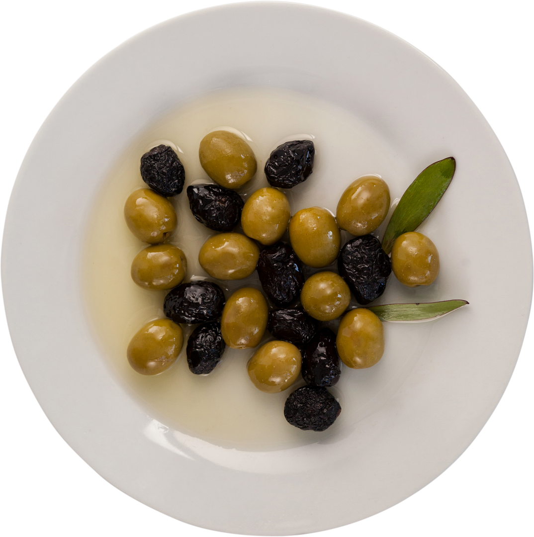 Close Up of Green and Black Olives with Oil on Transparent Plate - Download Free Stock Images Pikwizard.com