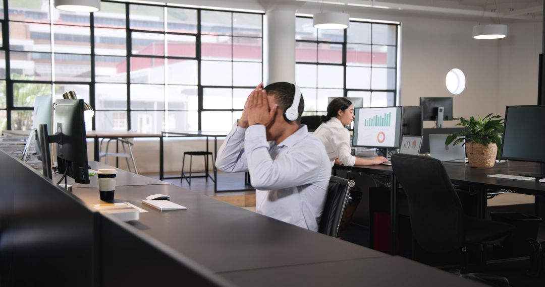 Successful Team Celebrating in Modern Office Workspace