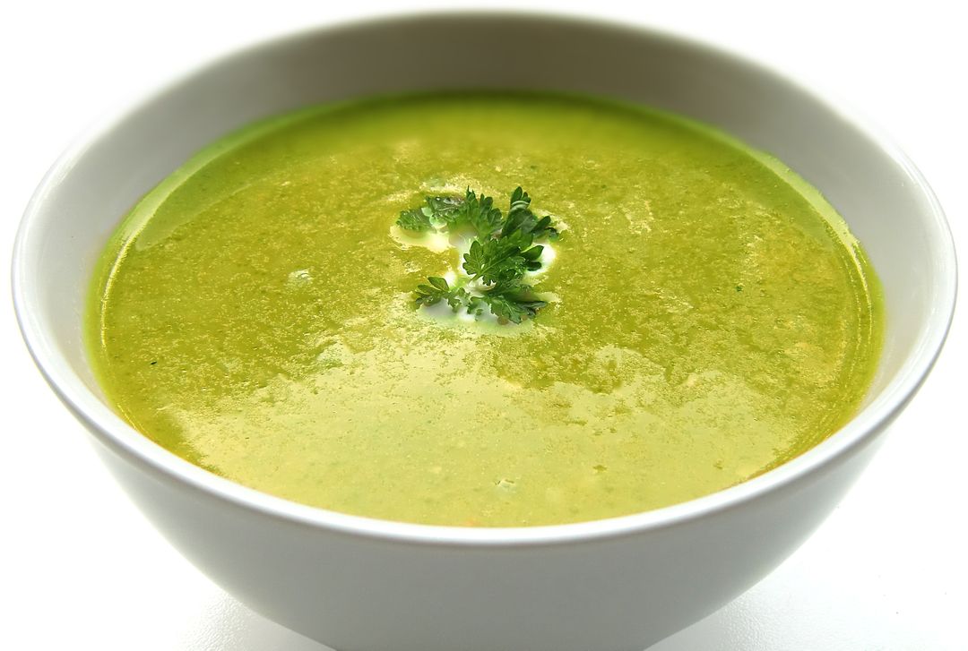 Fresh Green Pea Soup Garnished with Parsley - Free Images, Stock Photos and Pictures on Pikwizard.com