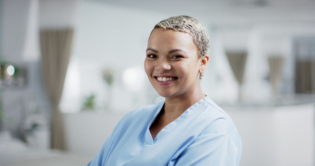 Smiling African American Nurse in Hospital - Free Images, Stock Photos and Pictures on Pikwizard.com