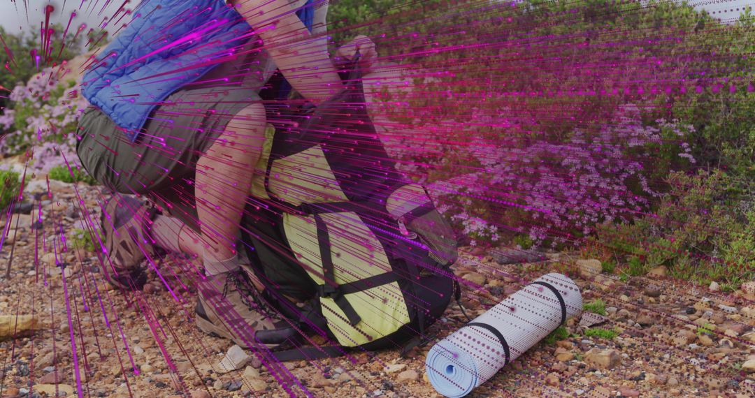 Hiker Securing Backpack for Mountainous Adventure