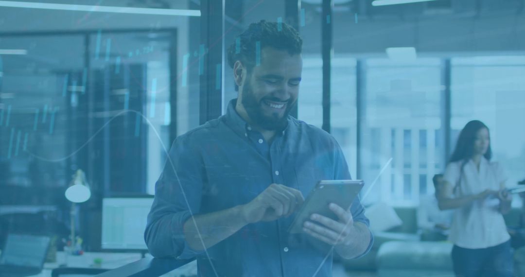 Smiling Businessman Using Tablet with Data Overlay in Modern Office