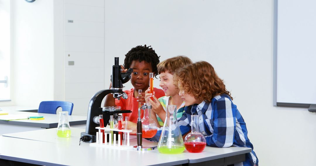 Curious Students Engaging in Science Experiment in Classroom - Free Images, Stock Photos and Pictures on Pikwizard.com