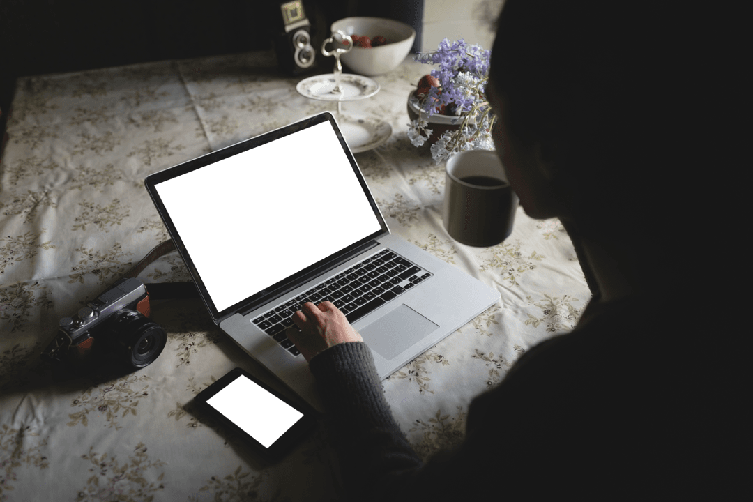 Transparent Screen Laptop with Coffee at Cozy Table Setting
