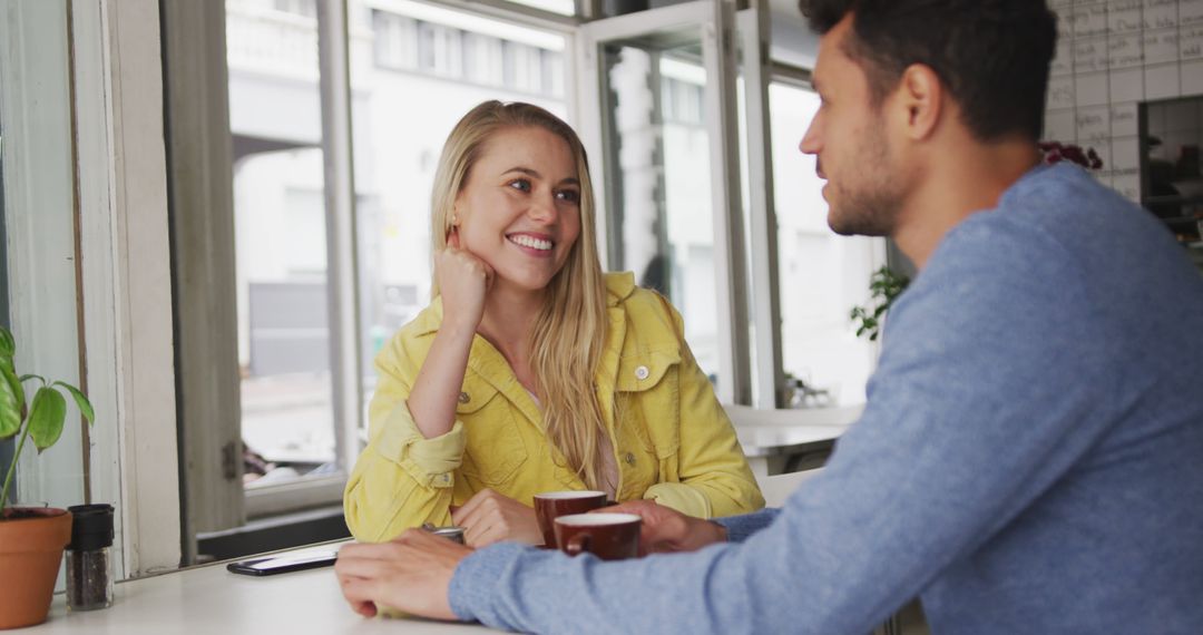 Happy Couple Enjoying Coffee Date at Urban Cafe