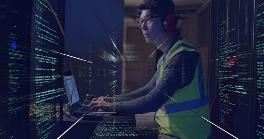 Engineer Analyzing Data in Advanced Server Room Equipment