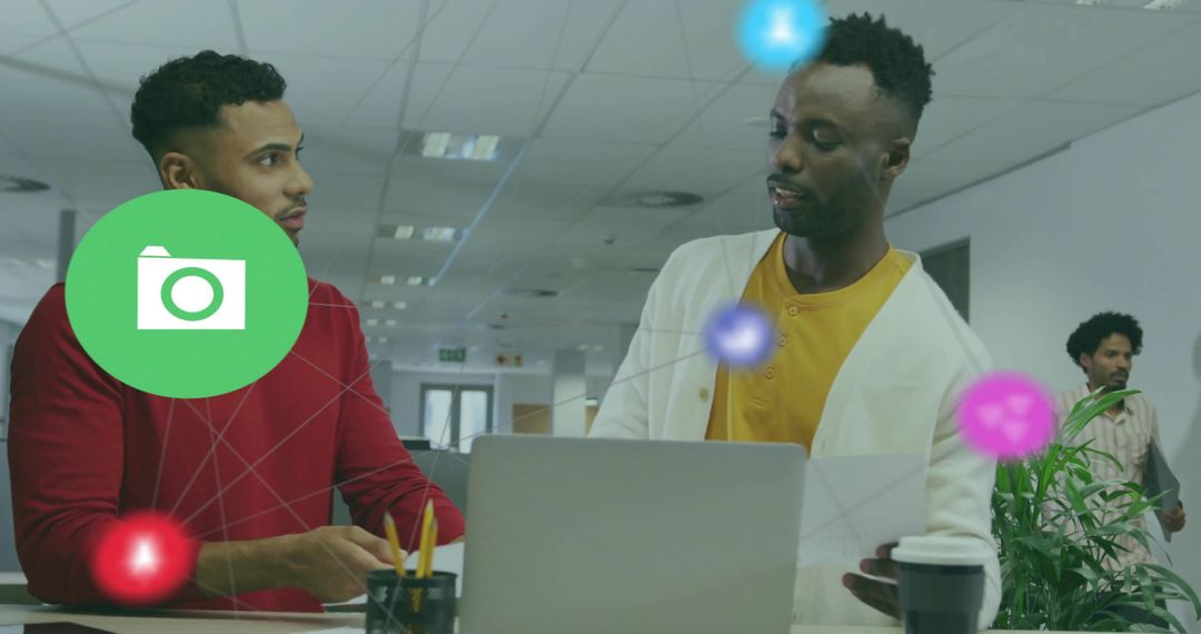Diverse Professionals Discussing Data in Open Plan Office Environment