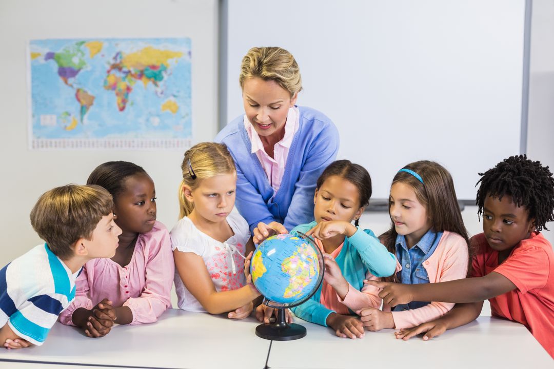Teacher Discussing Globe with Diverse Group of Children in Classroom - Free Images, Stock Photos and Pictures on Pikwizard.com
