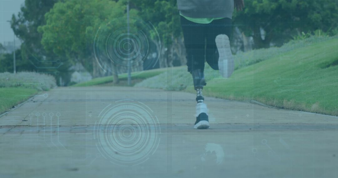 Athlete Running with Prosthetic Blade on Park Pathway