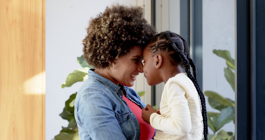 Parent and Child Affectionate Moment in Natural Light