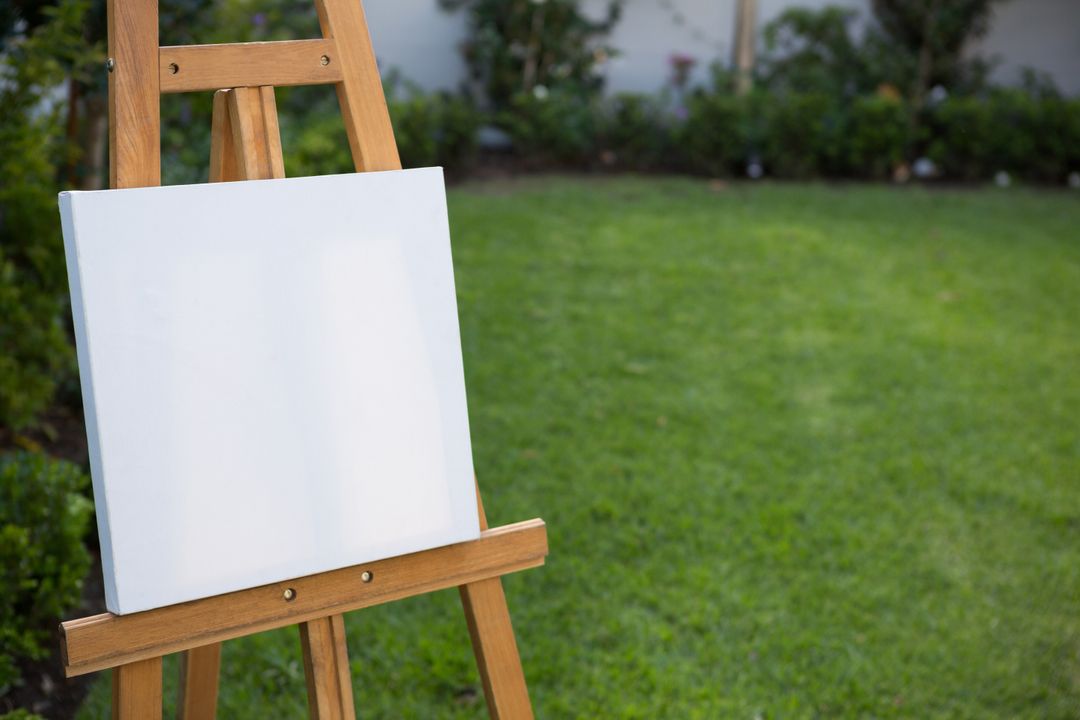 Blank Canvas on Easel in Garden - Free Images, Stock Photos and Pictures on Pikwizard.com