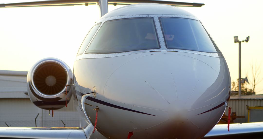 Luxury Private Jet Close-Up during Golden Hour at Airport