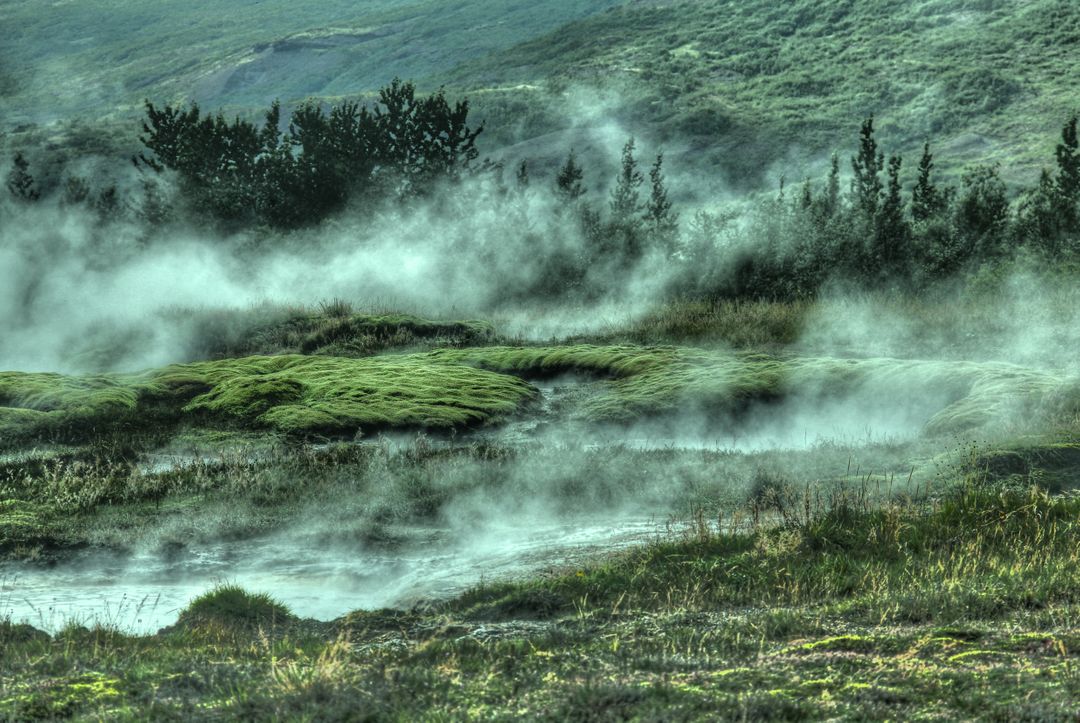 Steam Rising Over Lush Green Landscape in Iceland - Free Images, Stock Photos and Pictures on Pikwizard.com