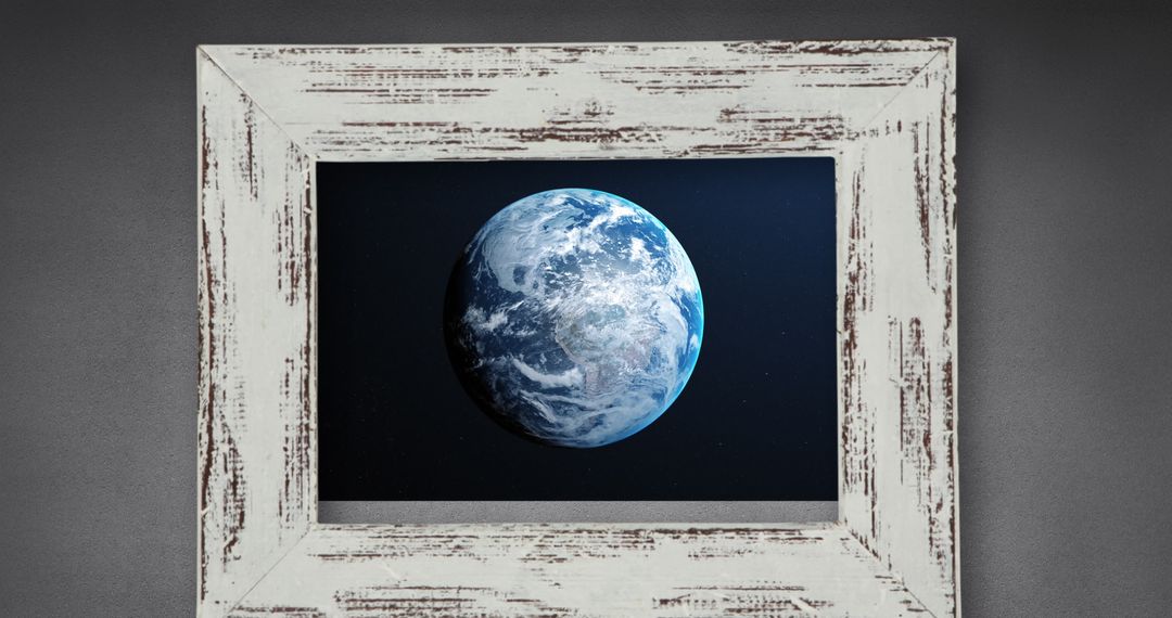 Framed Earth Globe Against Textured Gray Background