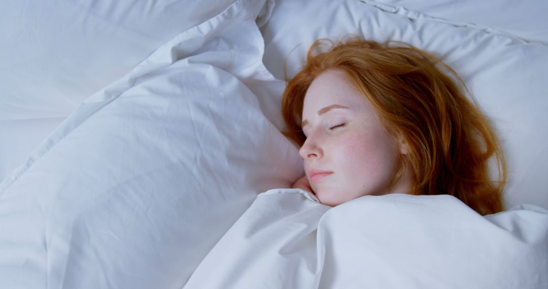 Peaceful Sleep of Redheaded Woman in Cozy White Bedding - Free Images, Stock Photos and Pictures on Pikwizard.com