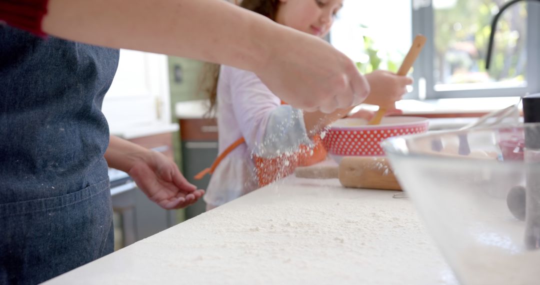 Mother and Daughter Enjoy Baking in Bright Kitchen