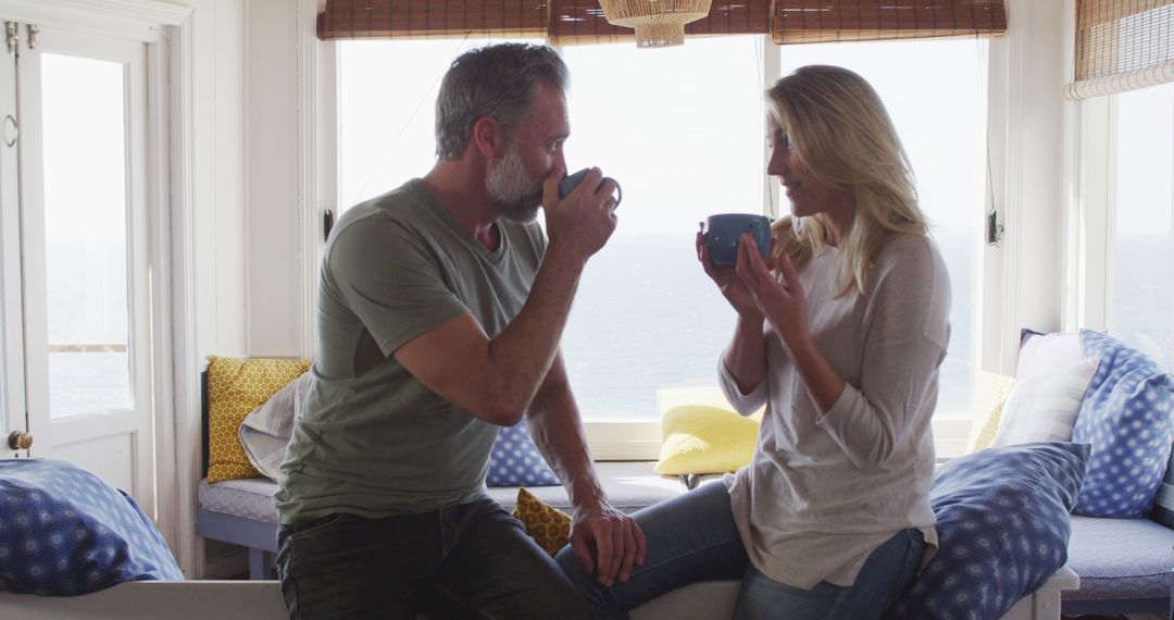 Happy Couple Enjoying Coffee in Sunny Home