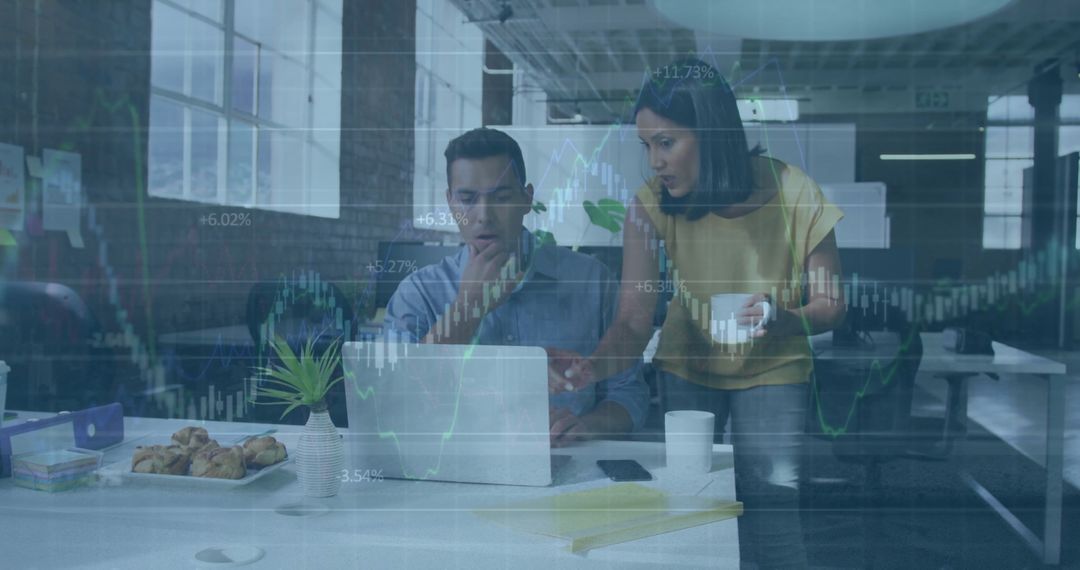 Businesspeople Analyzing Digital Financial Data on Laptop