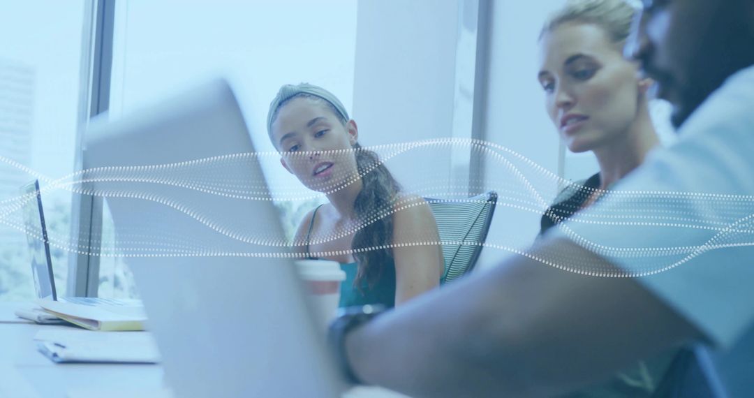 Team Collaboration on Project with Data Overlay in Modern Office